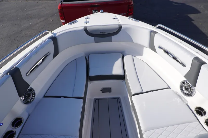 Slide: The Image of 2026 Chaparral 247 SSX boat interior with white seating and modern design. - 20