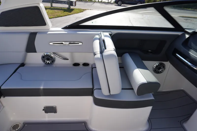 Slide: The Image of 2026 Chaparral 247 SSX boat interior with sleek seating and modern design features. - 31