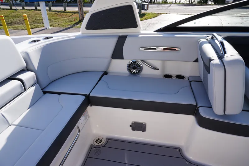 Slide: The Image of 2026 Chaparral 247 SSX boat interior with sleek seating and modern design features. - 32