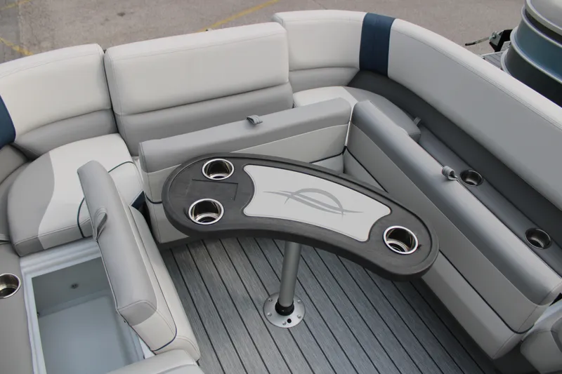 Slide: The Image of Luxurious seating area on 2025 SunCatcher Select 320RCX pontoon boat with cup holders. - 10