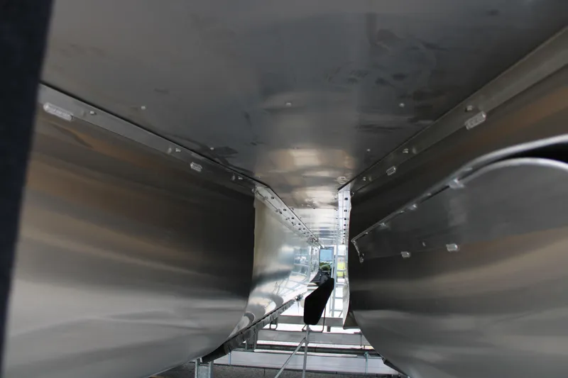 Slide: The Image of Underneath view of 2025 SunCatcher Select 320RCX pontoon boat, showcasing sleek aluminum construction. - 13