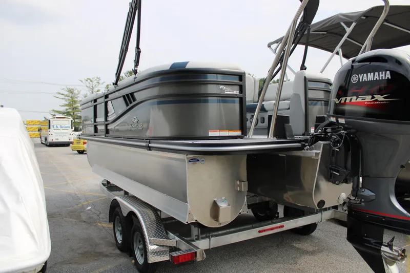 Slide: The Image of 2025 SunCatcher Select 320RCX pontoon boat with Yamaha VMAX engine on trailer. - 6