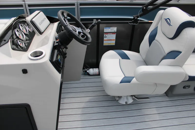 Slide: The Image of Captain's seat and helm of 2025 SunCatcher Select 320RCX boat, featuring modern controls. - 9