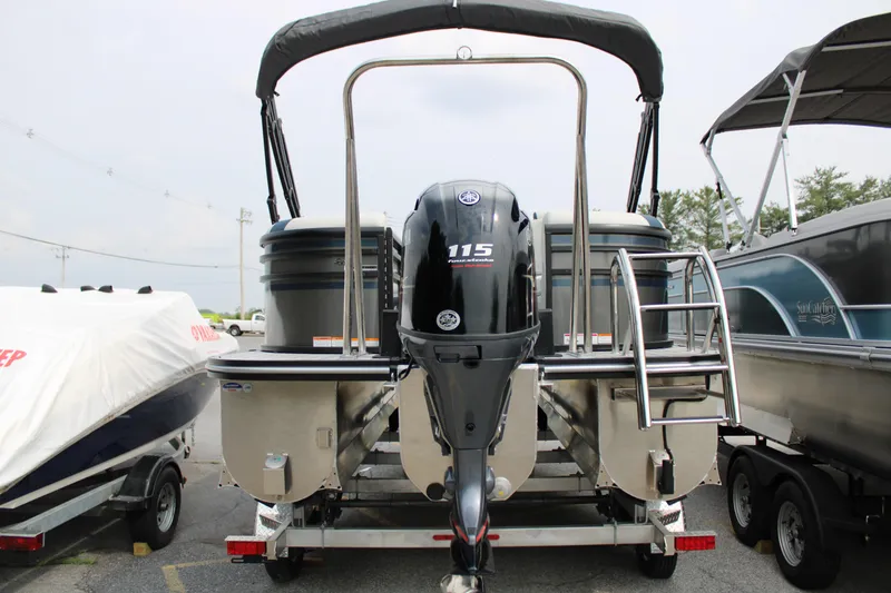 Slide: The Image of 2025 SunCatcher Select 320RCX pontoon boat with Yamaha 115 engine, rear view. - 5