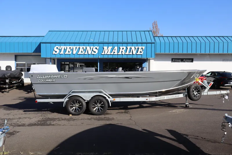 The Image of 2026 Alumaweld Columbia 23 boat on trailer at Stevens Marine dealership. - 1