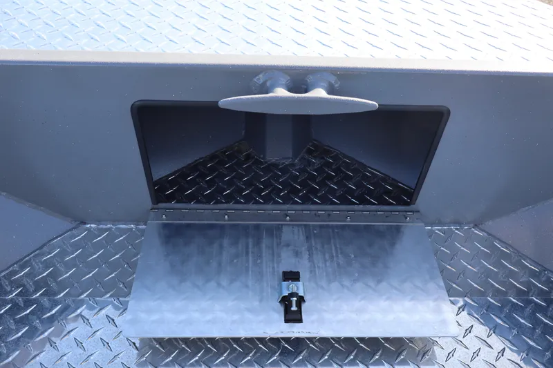 Slide: The Image of Alumaweld Columbia 23 (2026) boat compartment with diamond plate flooring. - 14