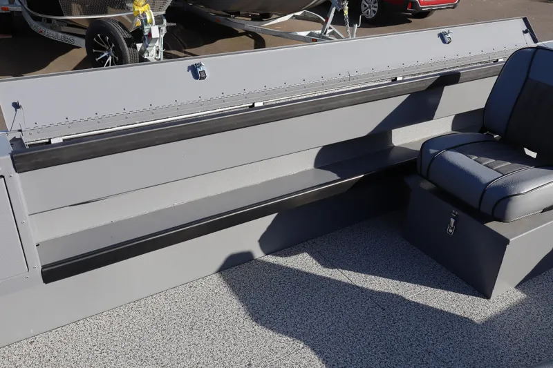 Slide: The Image of Interior of 2026 Alumaweld Columbia 23 boat, featuring seating and storage. - 17