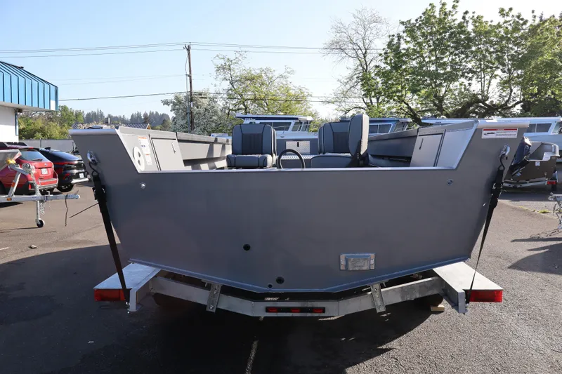 Slide: The Image of 2026 Alumaweld Columbia 23 boat on trailer, rear view in outdoor setting. - 4