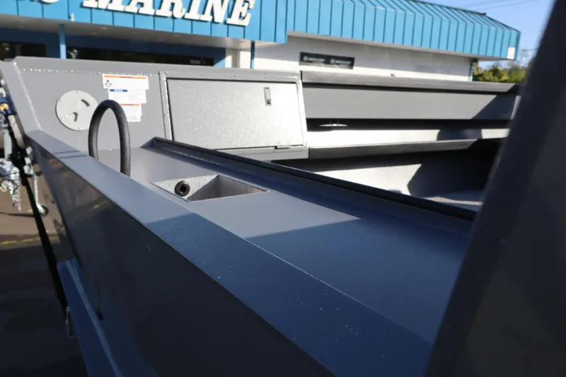 Slide: The Image of 2026 Alumaweld Columbia 23 boat exterior detail at a marine dealership. - 7