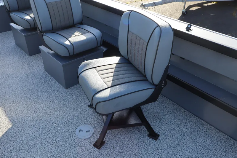 Slide: The Image of Boat seating in a 2026 Alumaweld Columbia 23, featuring gray cushioned seats. - 8