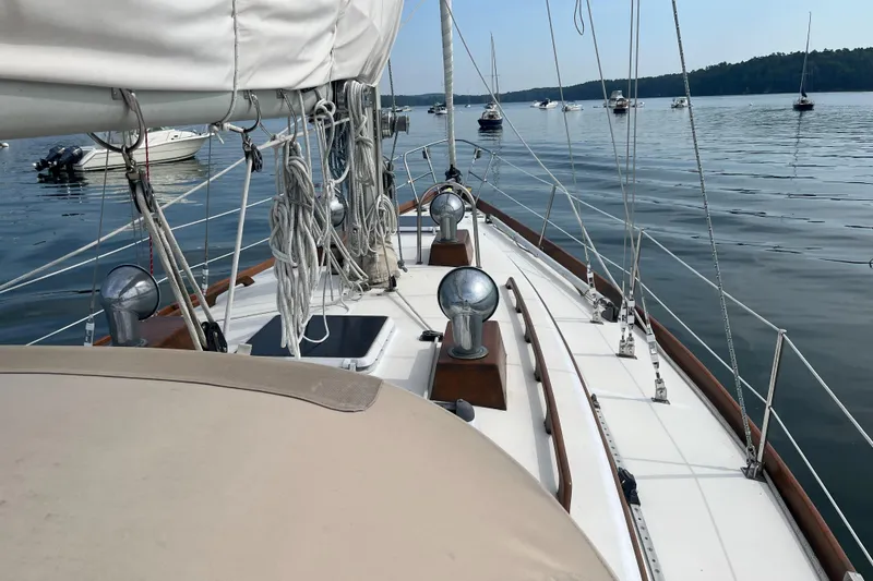 Slide: The Image of 1982 Bristol 38.8 sailboat on calm waters. - 6