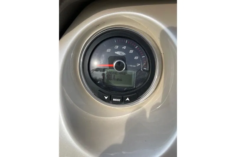 Slide: The Image of Tachometer of 2014 Chaparral 244 Sunesta showing engine hours and RPM. - 4