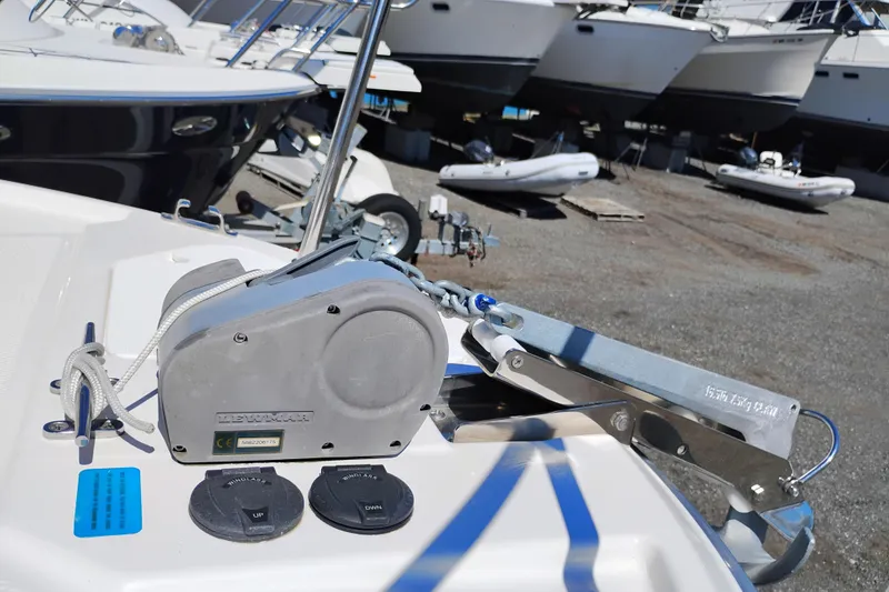 Slide: The Image of 2023 Ranger Tugs R-25 boat anchor system with Lewmar windlass in a marina setting. - 20