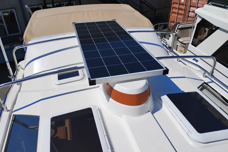 Slide: The Image of 2023 Ranger Tugs R-25 boat roof with solar panel and hatches. - 21