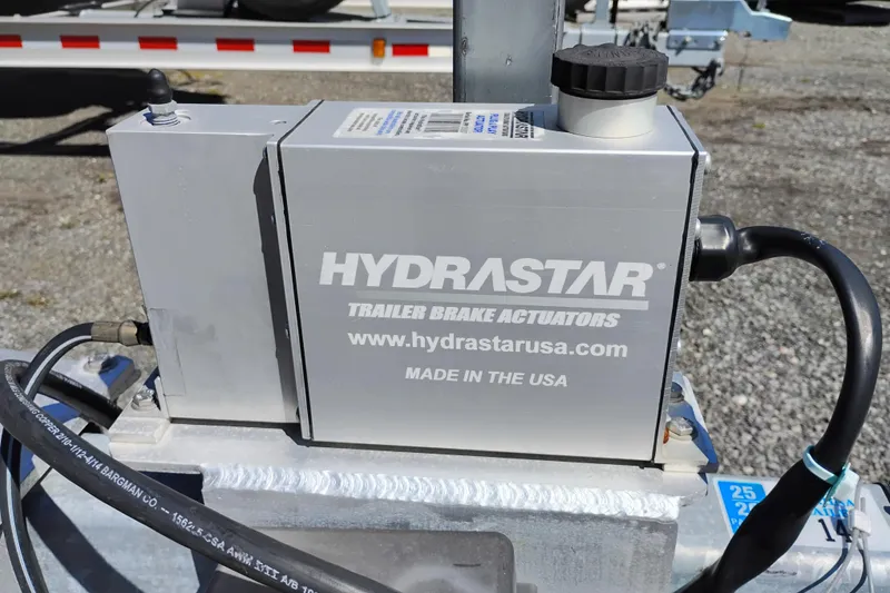 Slide: The Image of Hydrastar trailer brake actuator on a 2023 Ranger Tugs R-25, made in the USA. - 8
