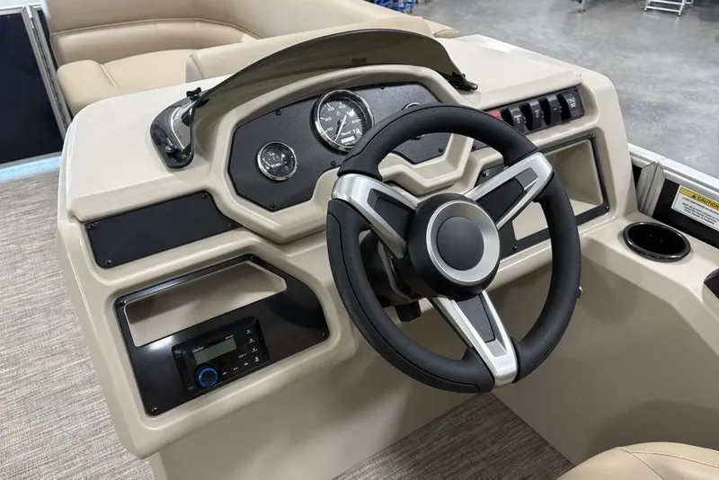 Slide: The Image of Steering console of 2026 Godfrey XPERIENCE 2086 boat with modern controls. - 16