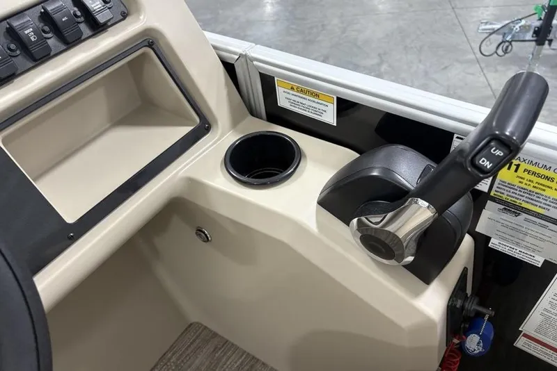 Slide: The Image of Control panel of 2026 Godfrey XPERIENCE 2086 boat with throttle and cup holder. - 9