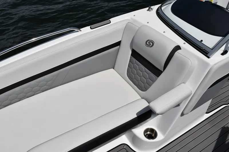 Slide: The Image of 2023 Hurricane SunDeck 217 OB boat interior with sleek, modern seating design. - 5