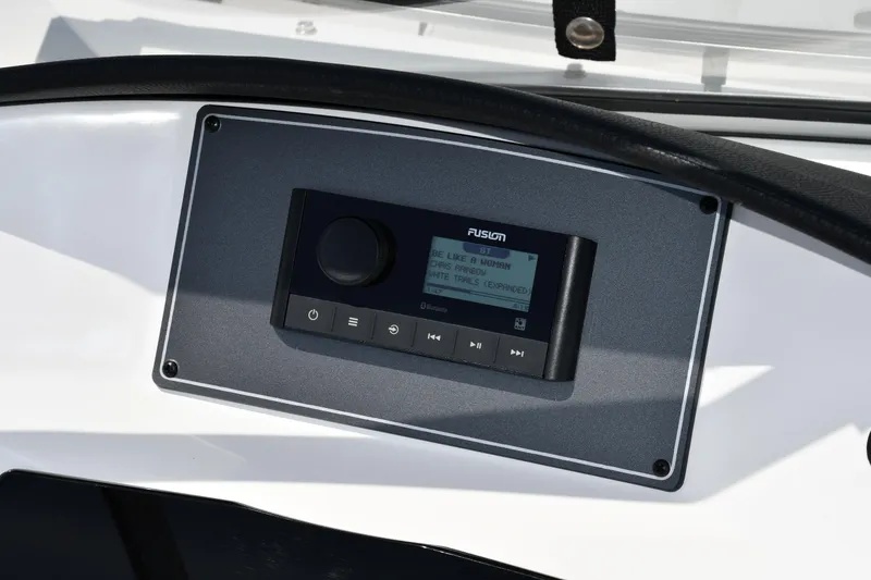 Slide: The Image of 2023 Hurricane SunDeck 217 OB boat dashboard with Fusion audio system. - 6