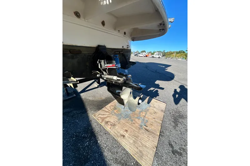 Slide: The Image of Rear view of a 2006 Monterey 270 Cruiser boat with Mercury outdrive on a sunny day. - 16