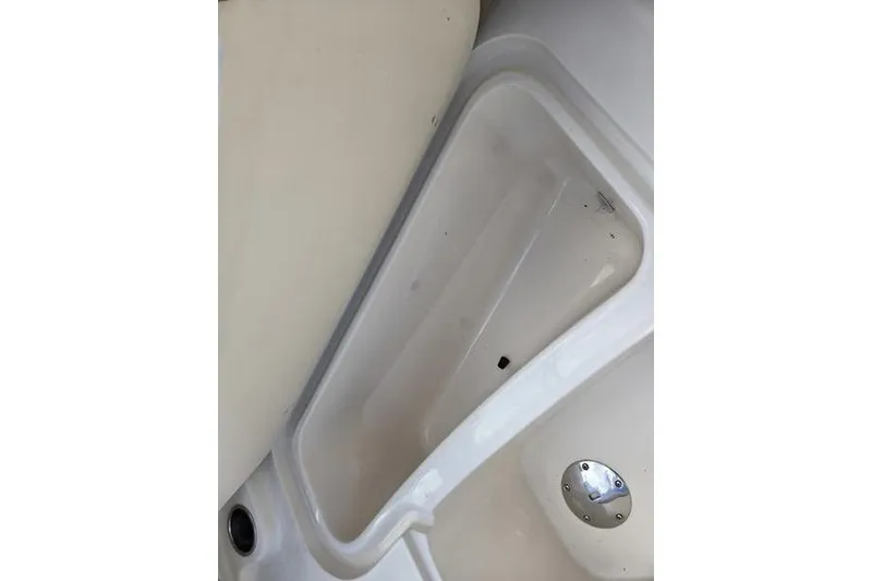 Slide: The Image of Interior view of a 2015 Grady-White Freedom 205 boat compartment. - 13