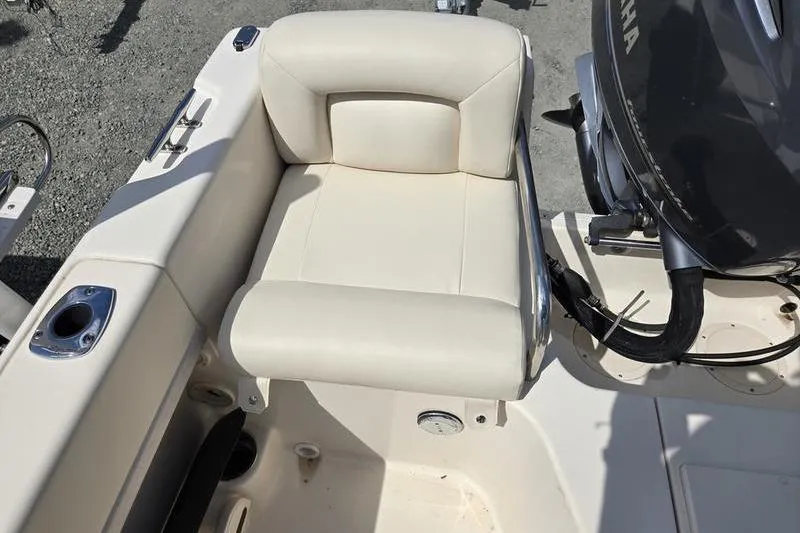 Slide: The Image of 2015 Grady-White Freedom 205 boat seat and Yamaha engine detail. - 25