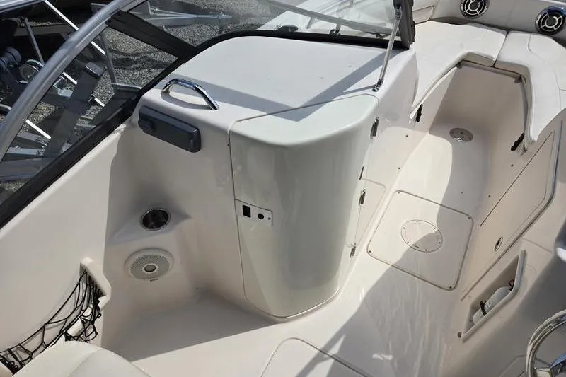 Slide: The Image of 2015 Grady-White Freedom 205 boat interior with seating and storage compartments. - 5
