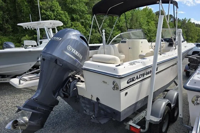 Slide: The Image of 2015 Grady-White Freedom 205 boat with Yamaha engine, parked on a trailer. - 7