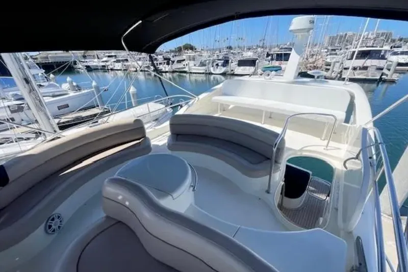 Slide: The Image of Luxurious 2004 Azimut 46 yacht interior with elegant seating at marina. - 27
