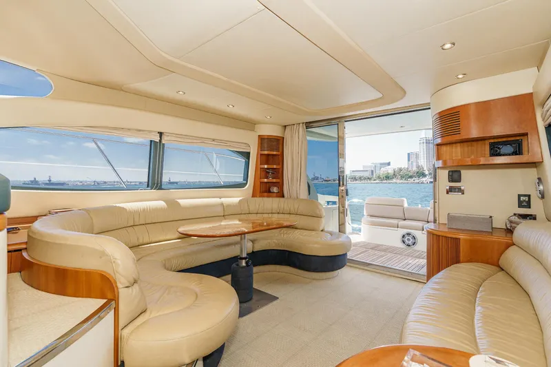 Slide: The Image of Luxurious interior of a 2004 Azimut 46 yacht with elegant seating and scenic ocean view. - 42