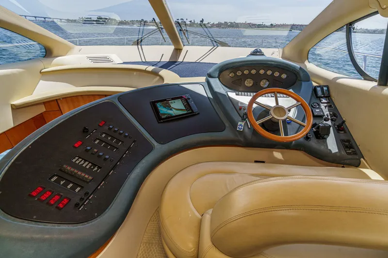 Slide: The Image of 2004 Azimut 46 yacht helm with modern controls and panoramic sea view. - 47
