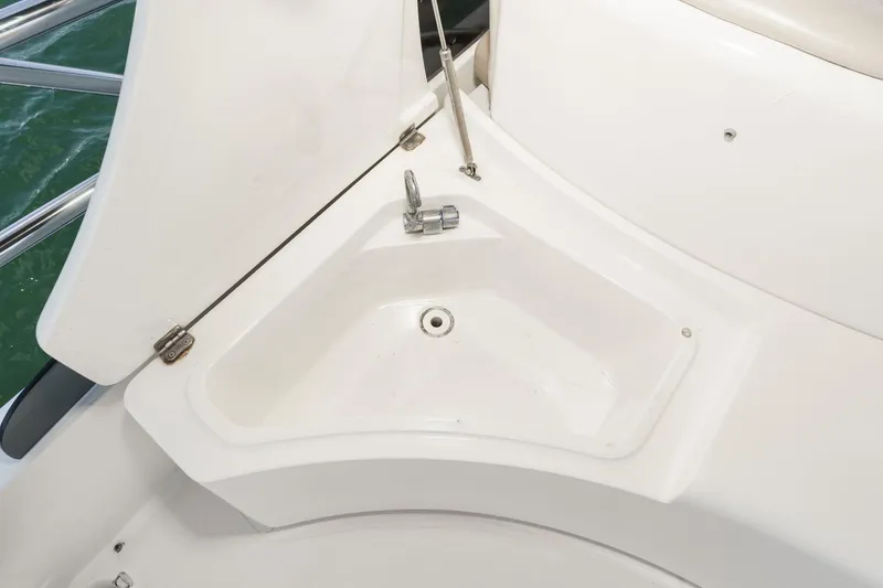 Slide: The Image of Luxurious interior of a 2004 Azimut 46 yacht with elegant seating and panoramic windows. - 53