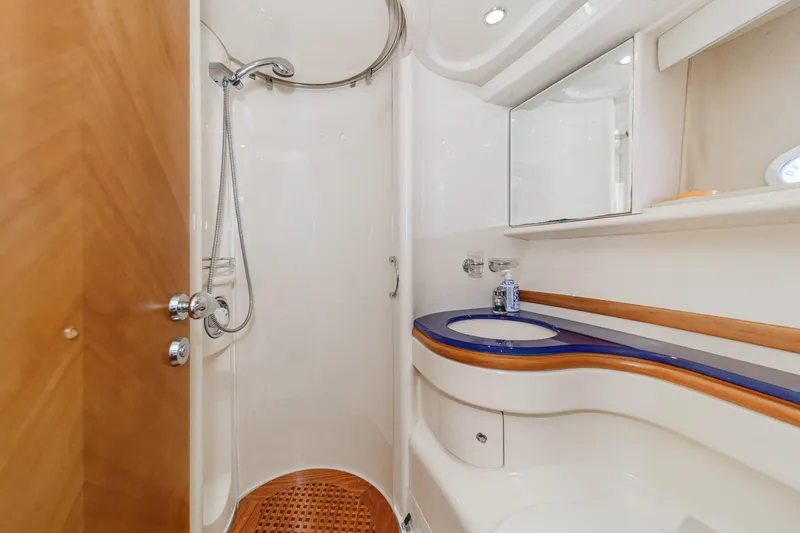 Slide: The Image of Luxurious 2004 Azimut 46 yacht bathroom with modern shower and elegant sink design. - 66