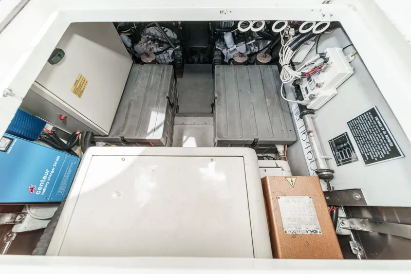 Slide: The Image of Engine room of 2004 Azimut 46 yacht, featuring equipment and wiring. - 72