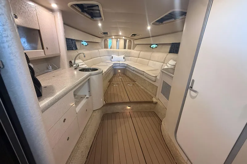 Slide: The Image of Luxurious interior of a 1999 Formula 400 Super Sport yacht with modern amenities. - 15