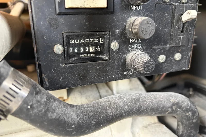 Slide: The Image of Control panel of a 1999 Formula 400 Super Sport with hour meter reading 493.1 hours. - 18