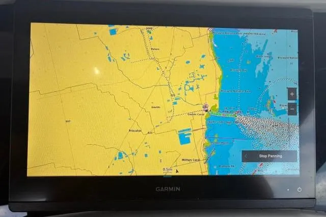 Slide: The Image of Garmin navigation display showing coastal map on a Formula 400 Super Sport, 1999 model. - 8
