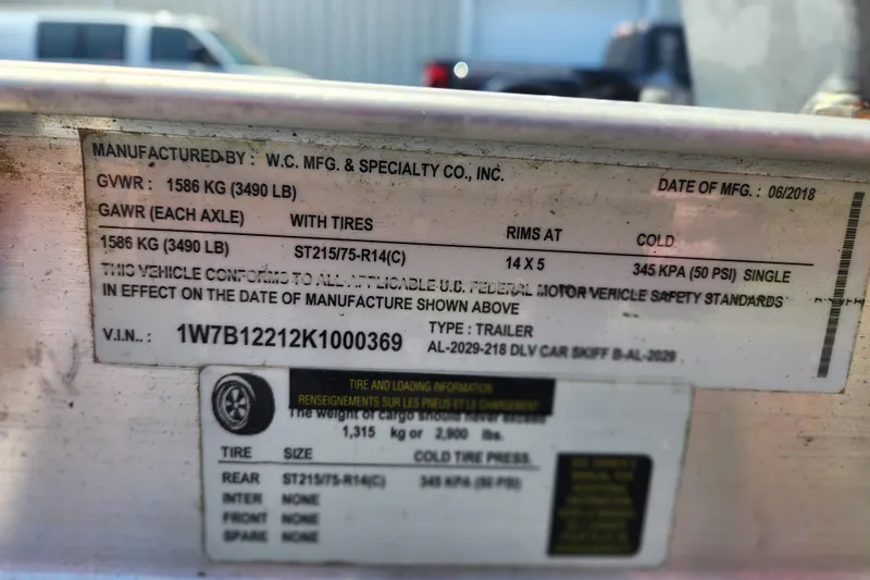 Slide: The Image of Label on a 2019 Carolina Skiff 218 DLV trailer, showing specifications and compliance details. - 17