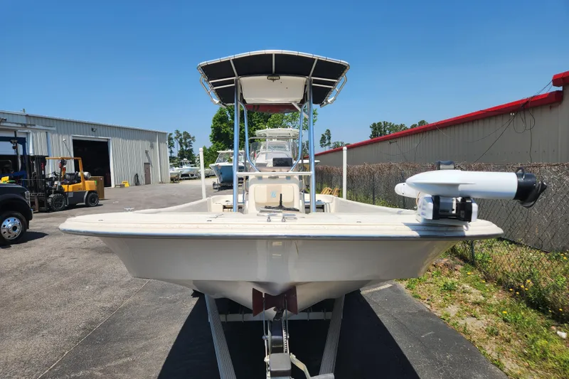 Slide: The Image of 2019 Carolina Skiff 218 DLV boat on trailer, outdoor storage area. - 3