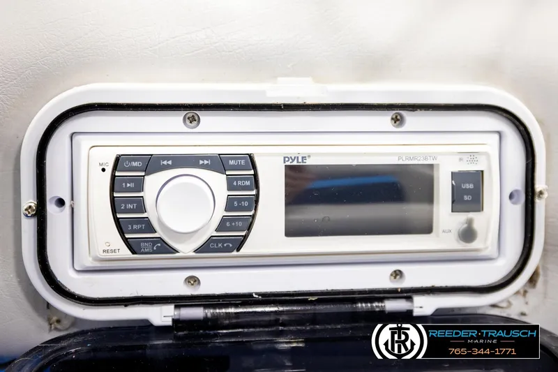 Slide: The Image of Pyle marine stereo system with USB and SD inputs, model PLRMR23BTW, mounted on a Hydra 192-23. - 30