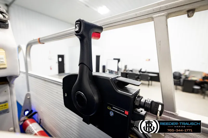 Slide: The Image of Close-up of a Hydra 192-23 boat throttle control in a workshop setting. - 34