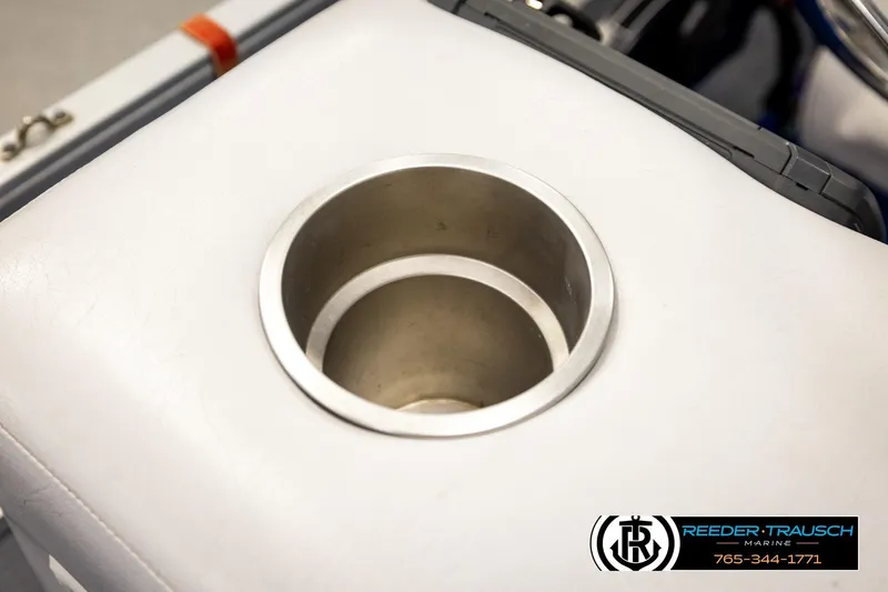 Slide: The Image of Cup holder on a 1994 Hydra 192-23 boat seat, featuring Reeder-Trausch Marine branding. - 41