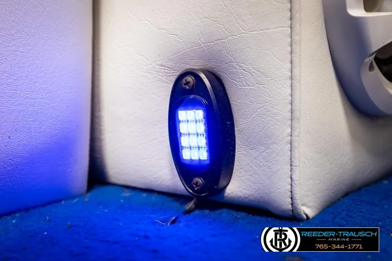 Slide: The Image of Blue LED light on white leather interior of 1994 Hydra 192-23 boat. - 44