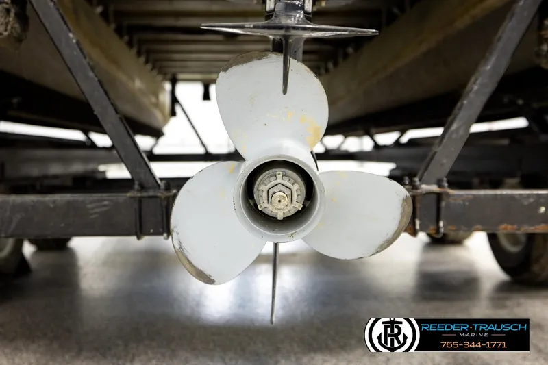 Slide: The Image of Close-up of a 1994 Hydra 192-23 boat propeller on a trailer. - 48