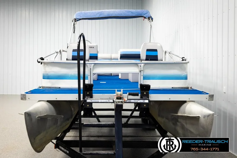 Slide: The Image of 1994 Hydra 192-23 pontoon boat on trailer in indoor storage facility. - 8