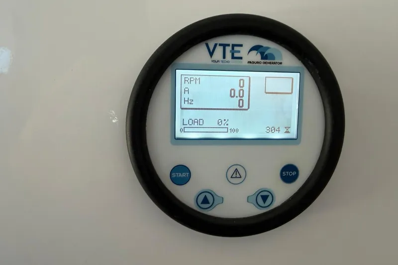 Slide: The Image of VTE generator control panel on 1984 Ocean Yachts 55 Super Sport. - 28