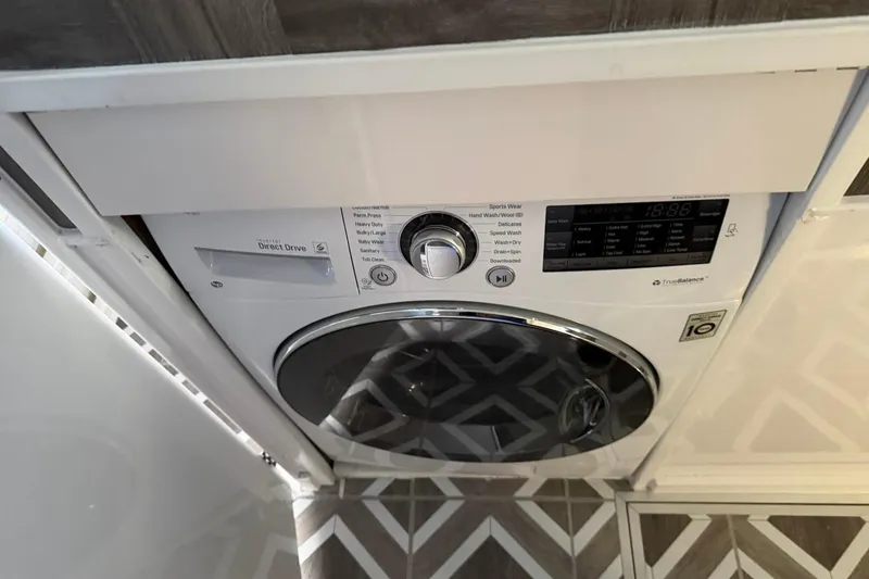 Slide: The Image of Washing machine in Ocean Yachts 55 Super Sport, 1984 model, with patterned flooring. - 35