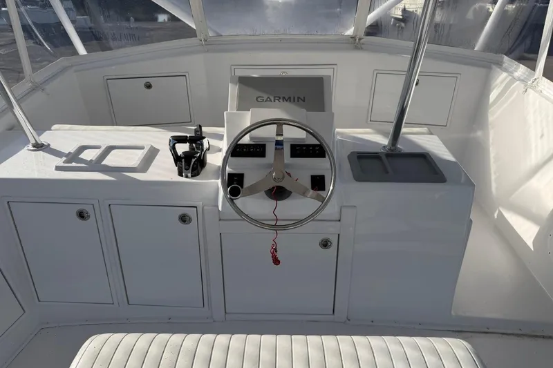 Slide: The Image of Helm of 1984 Ocean Yachts 55 Super Sport with Garmin navigation system. - 38