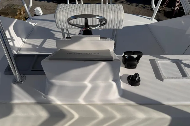 Slide: The Image of 1984 Ocean Yachts 55 Super Sport helm with steering wheel and navigation equipment. - 40