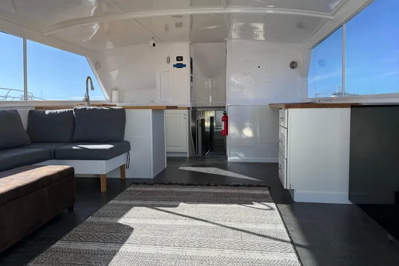 Slide: The Image of Interior of 1984 Ocean Yachts 55 Super Sport with modern seating and large windows. - 46